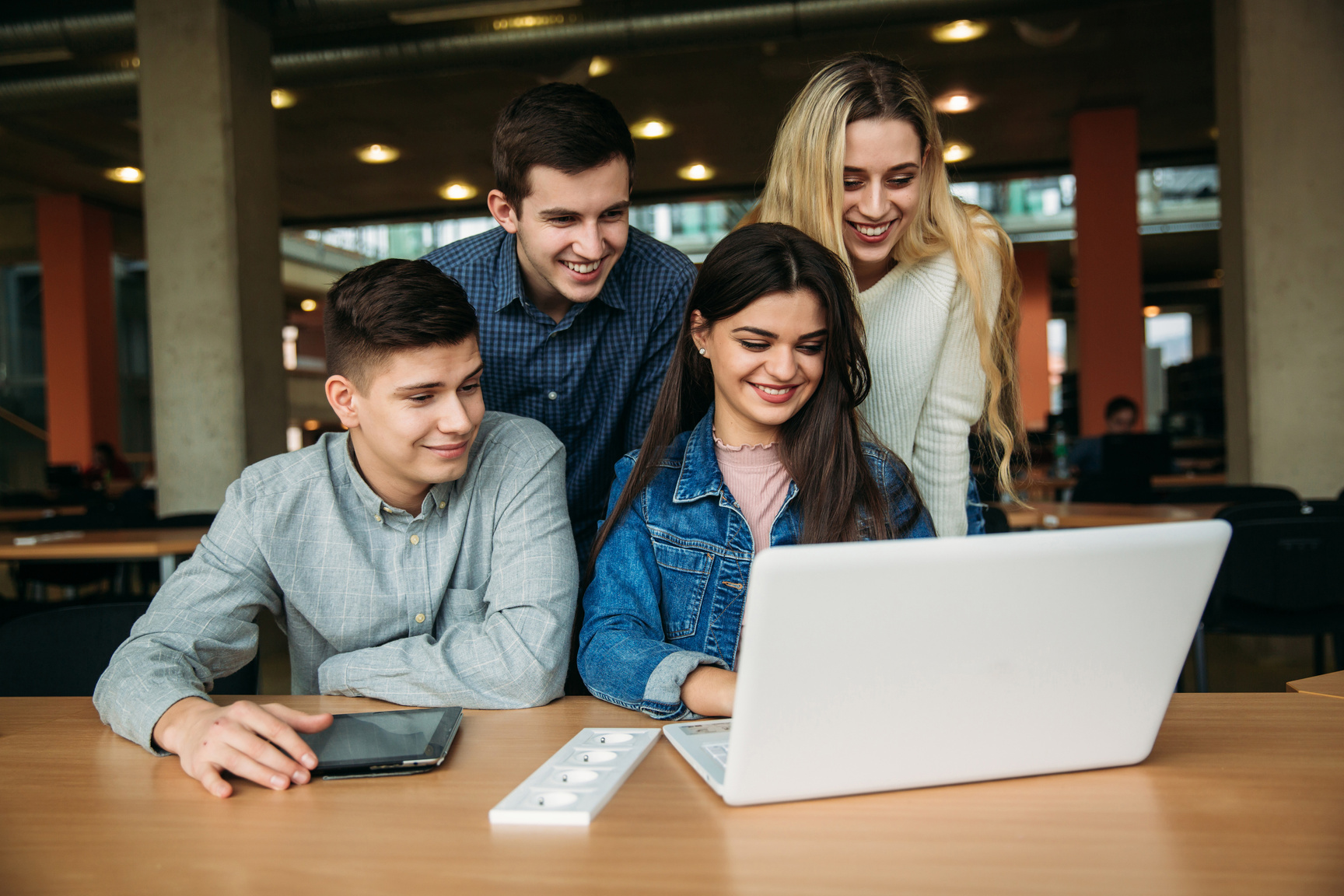 Group of College Students Studying at the Library